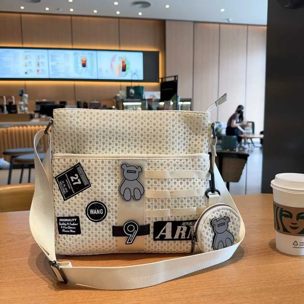 Mesh crossbody bag large capacity white net horizontal square shape with slit pocket and single shoulder strap