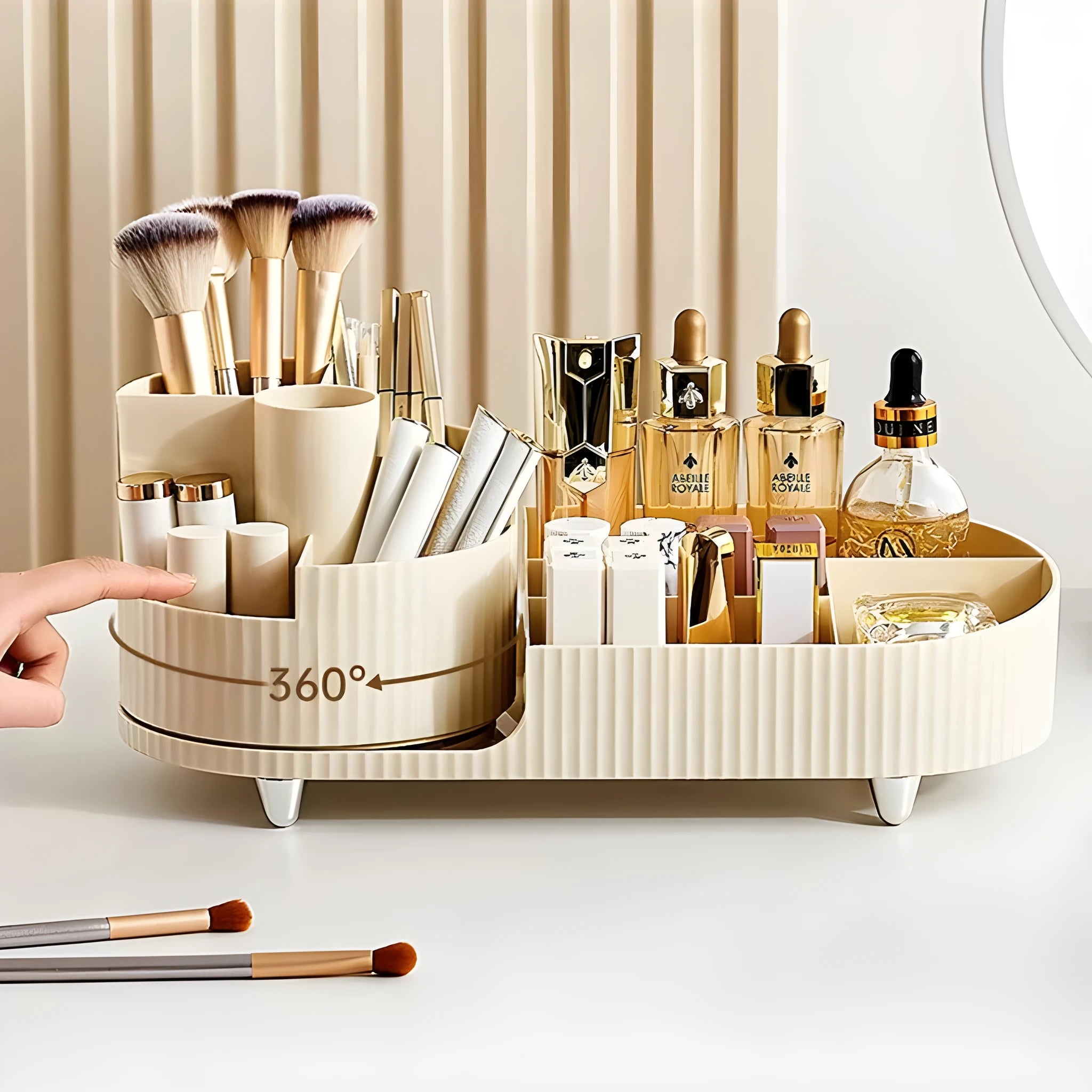 Rotating cosmetics storage box organiser for makeup brushes and lipsticks on a table.