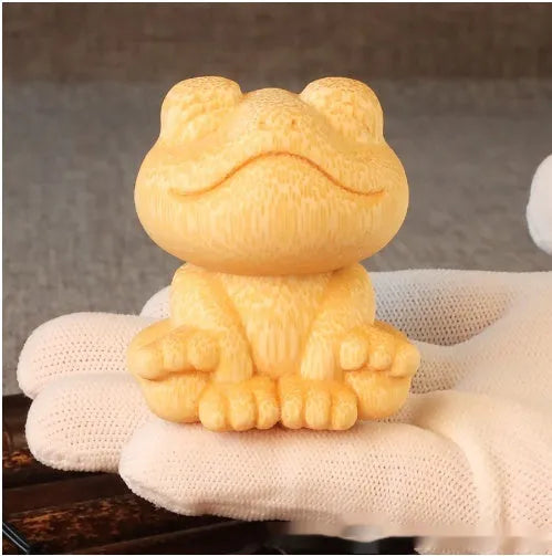 Smiling frog solid bamboo carving ornament with cartoon style measuring 5cm tall
