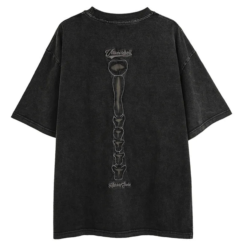 Black loose fit cotton t-shirt with a skull and letter graphic print, drop shoulder sleeves.