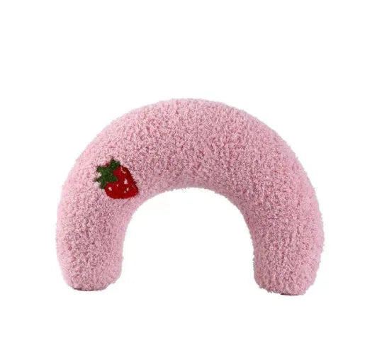 Small U-shaped plush pet pillow in blue for a cat or small dog to sleep on.