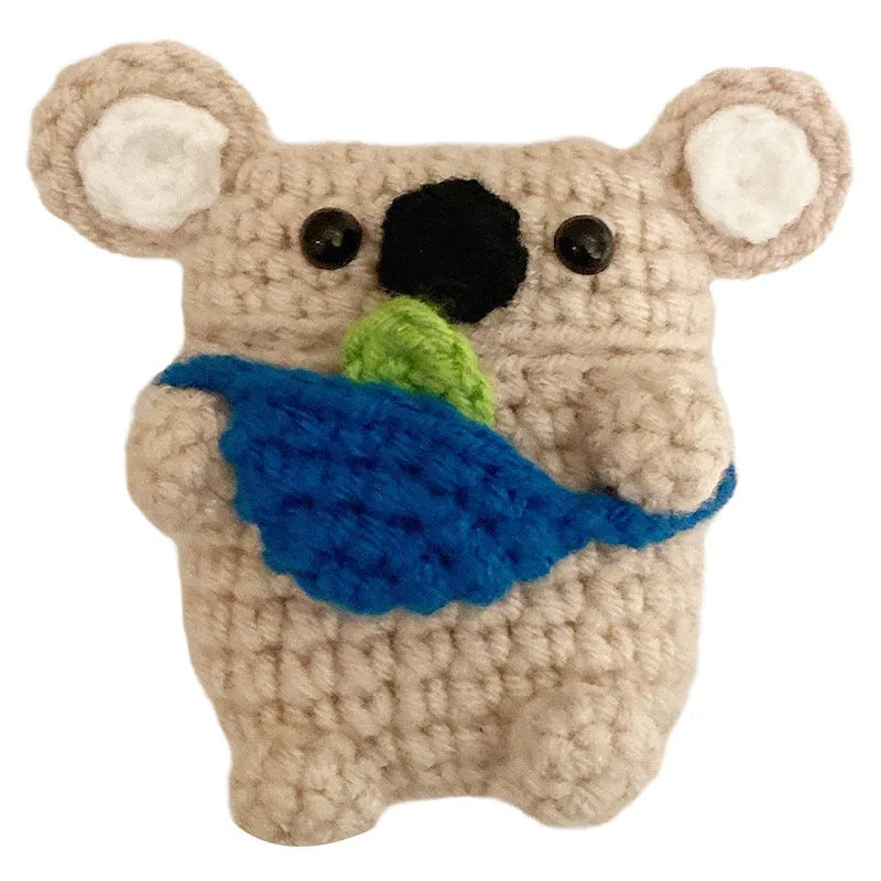 Hand-knitted koala bear backpack design protective cover for Apple AirPods charging case.