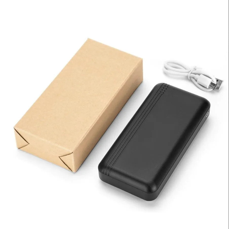 Graphene heating clothing power bank with plastic shell and USB cable on white background