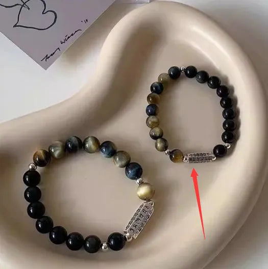 Sterling silver couple bracelet with tigereye obsidian gemstones and six words mantra design.