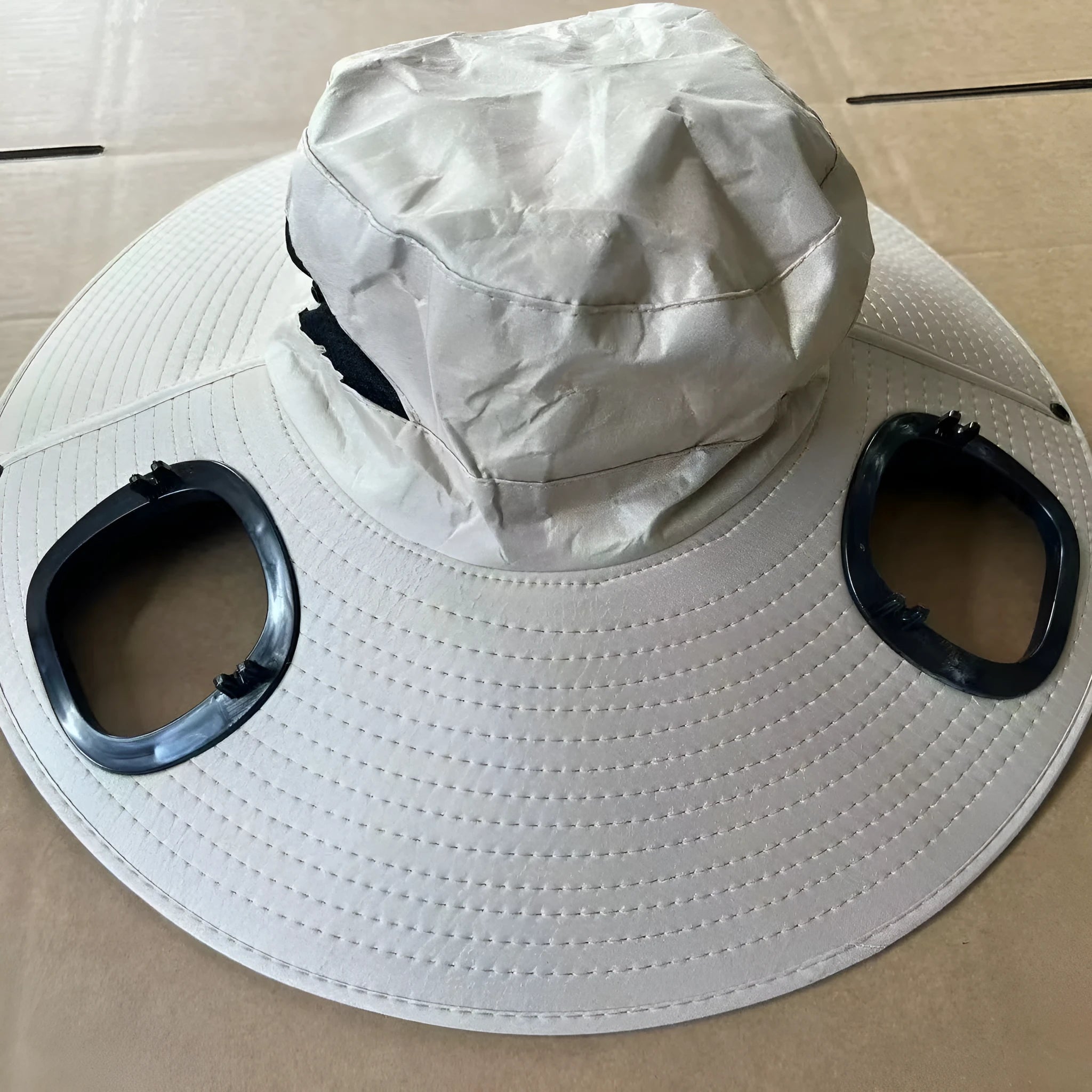 Men's grey solar fan cap with large sun-shading brim and removable cooling fan component