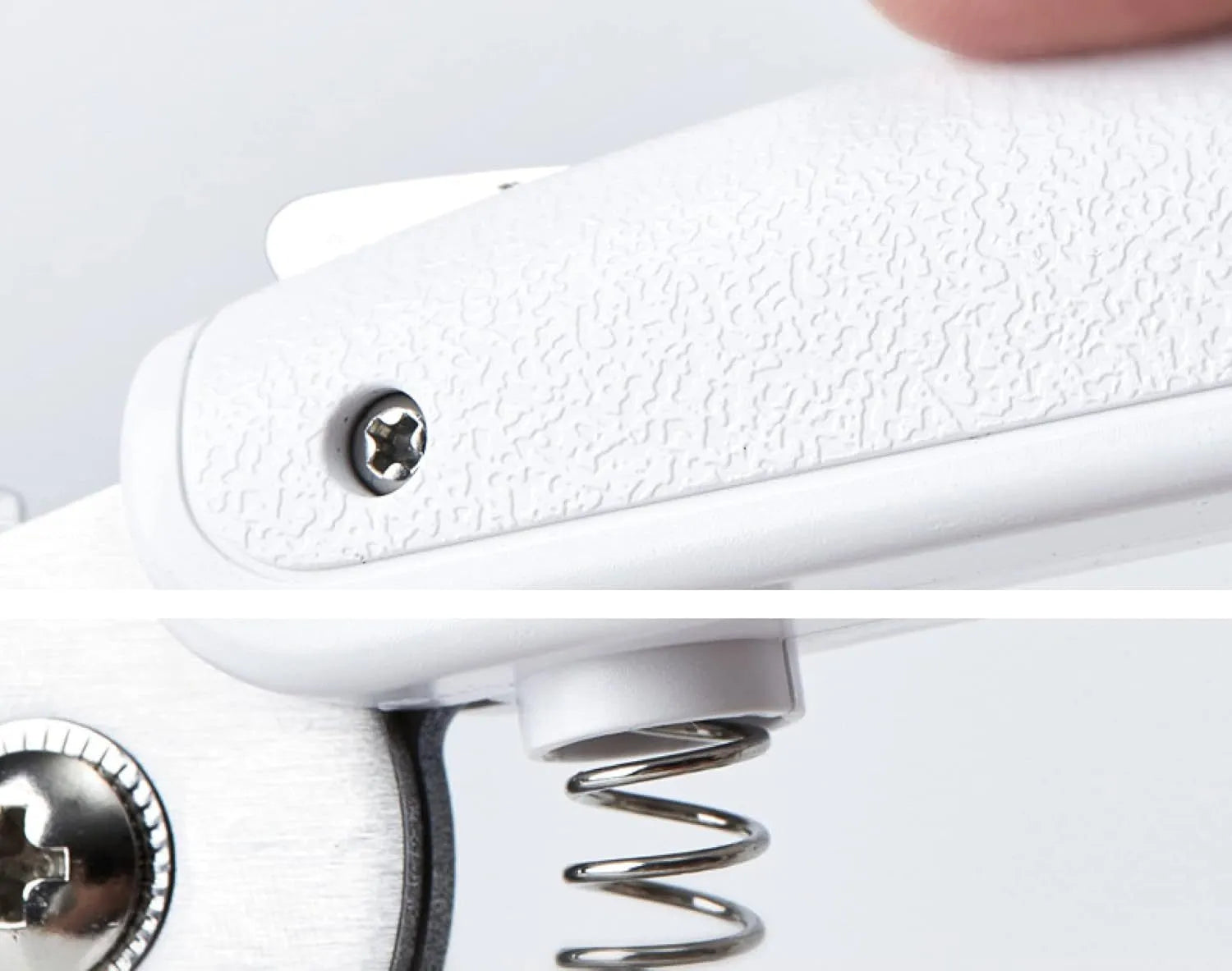 White pet nail clipper with LED light and transparent anti-splash guard on a blue background.