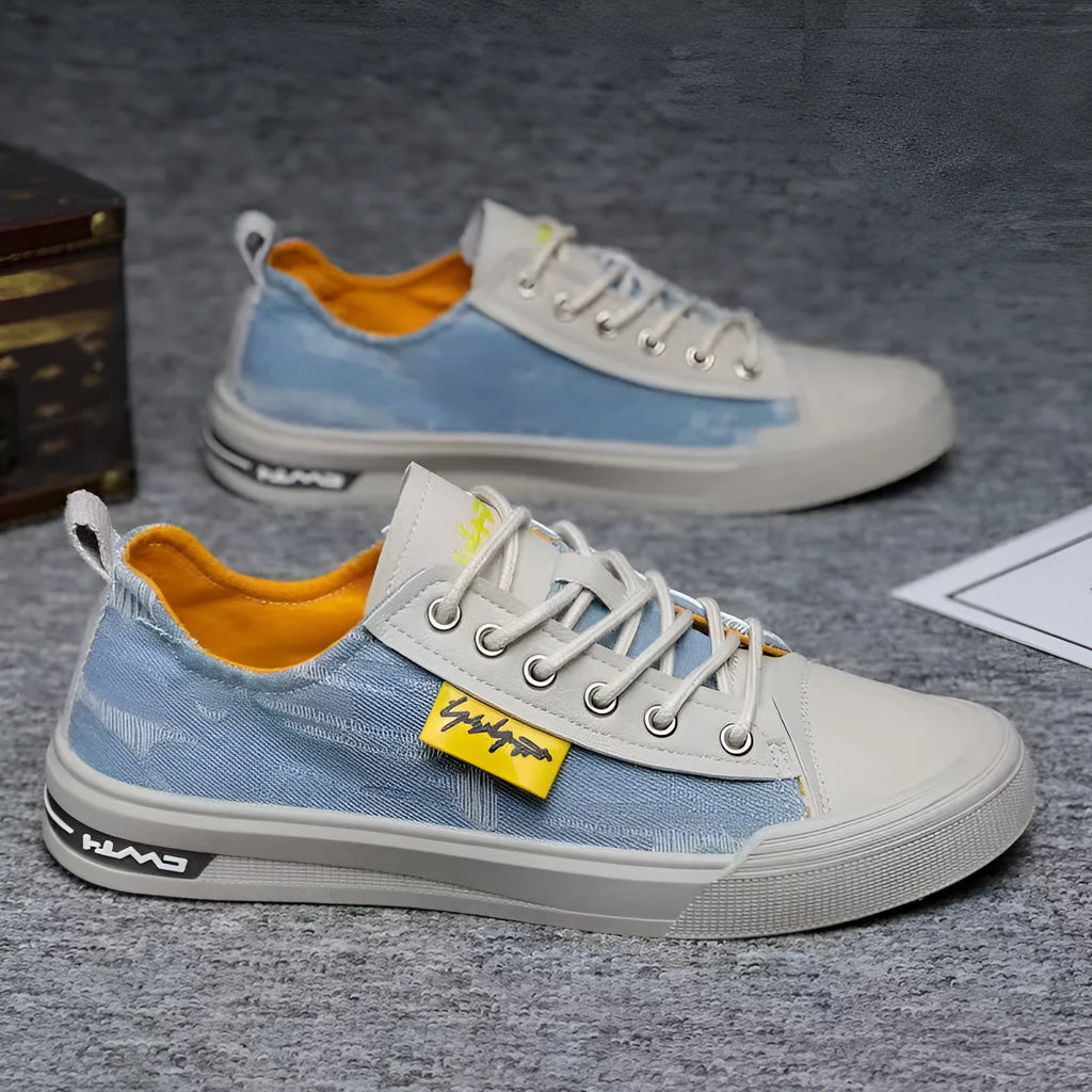 Men's canvas casual shoes in dark blue with front lace-up closure and rubber sole