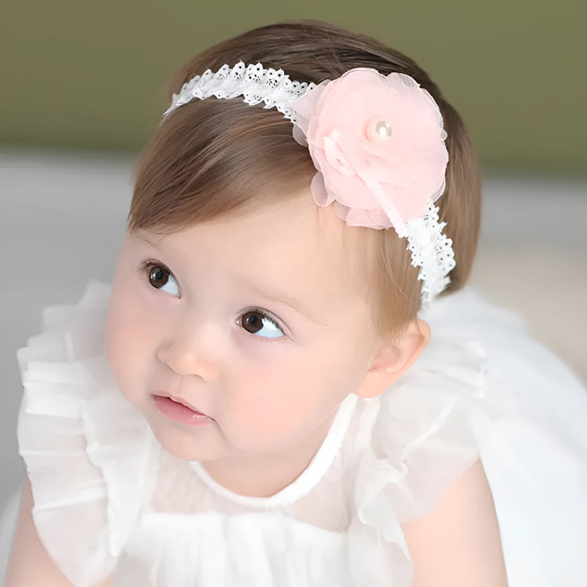 Korean children's fabric flower hairpins in pink and white on display