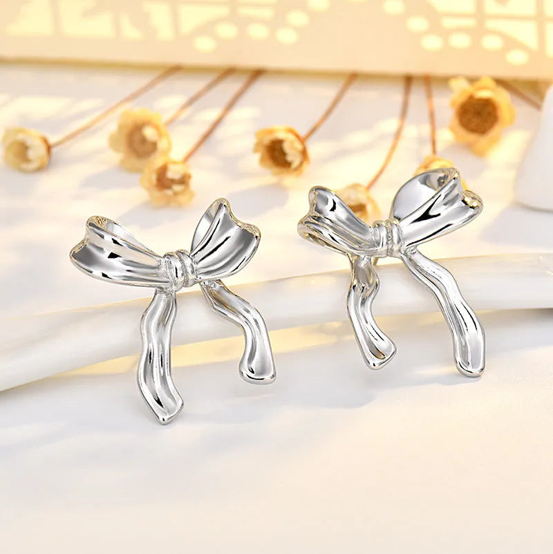 Silver bow copper earrings set with ear clip and ear buckle for women