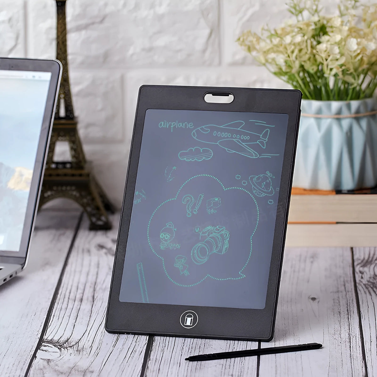LCD sketchpad tablet with 8.5 inch screen, special writing pen, and ABS frame on a desk