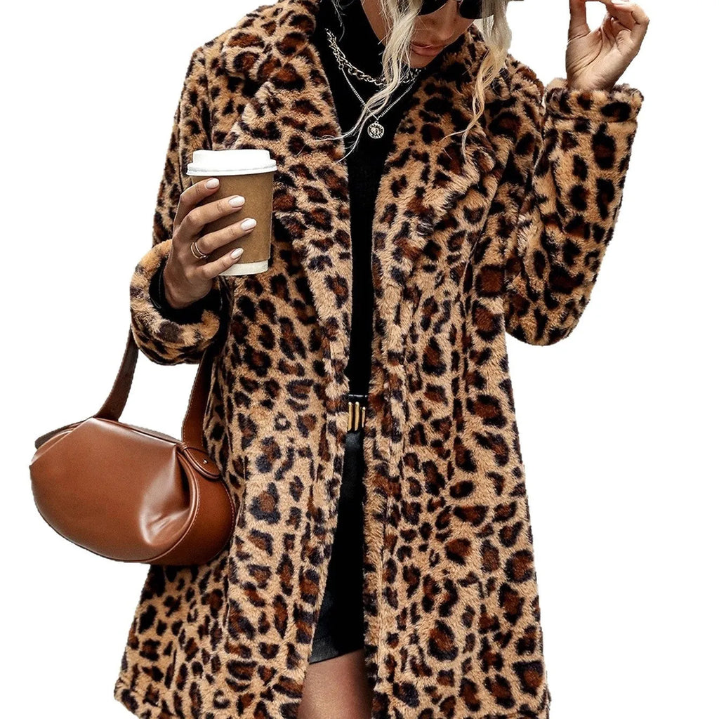Leopard print long sleeve furry coat top with animal pattern on a plain background