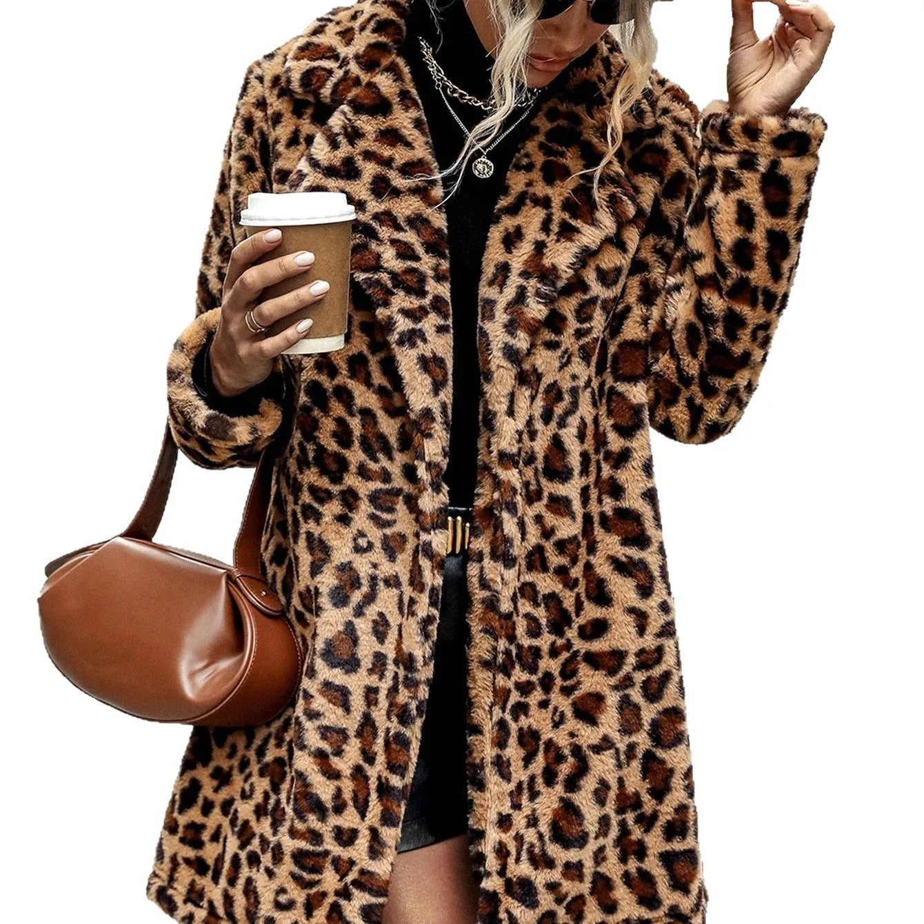 Leopard print long sleeve furry coat top with animal pattern on a plain background