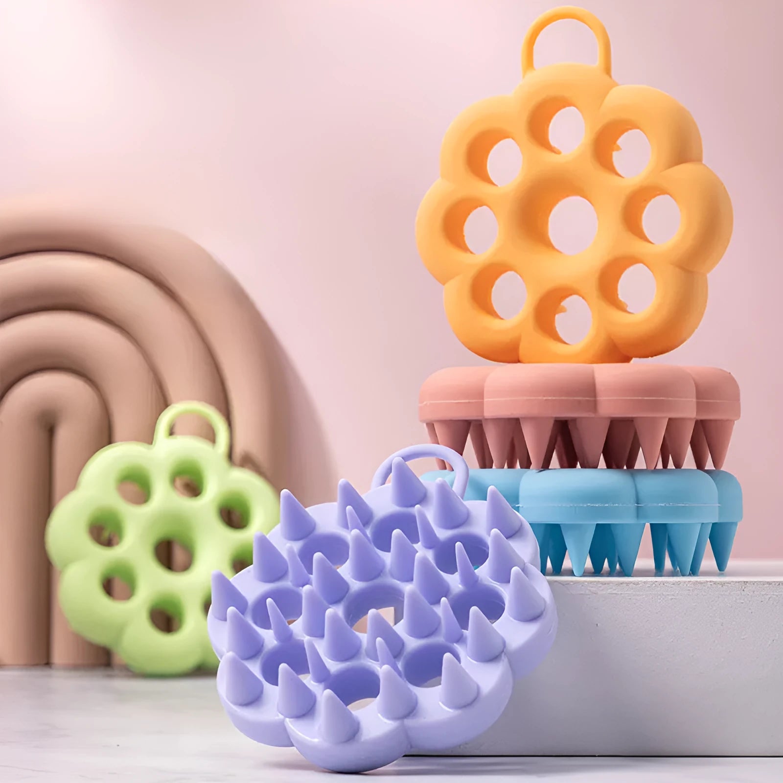 Silicone pet grooming brush with flexible bristles for dogs and cats in five colour options