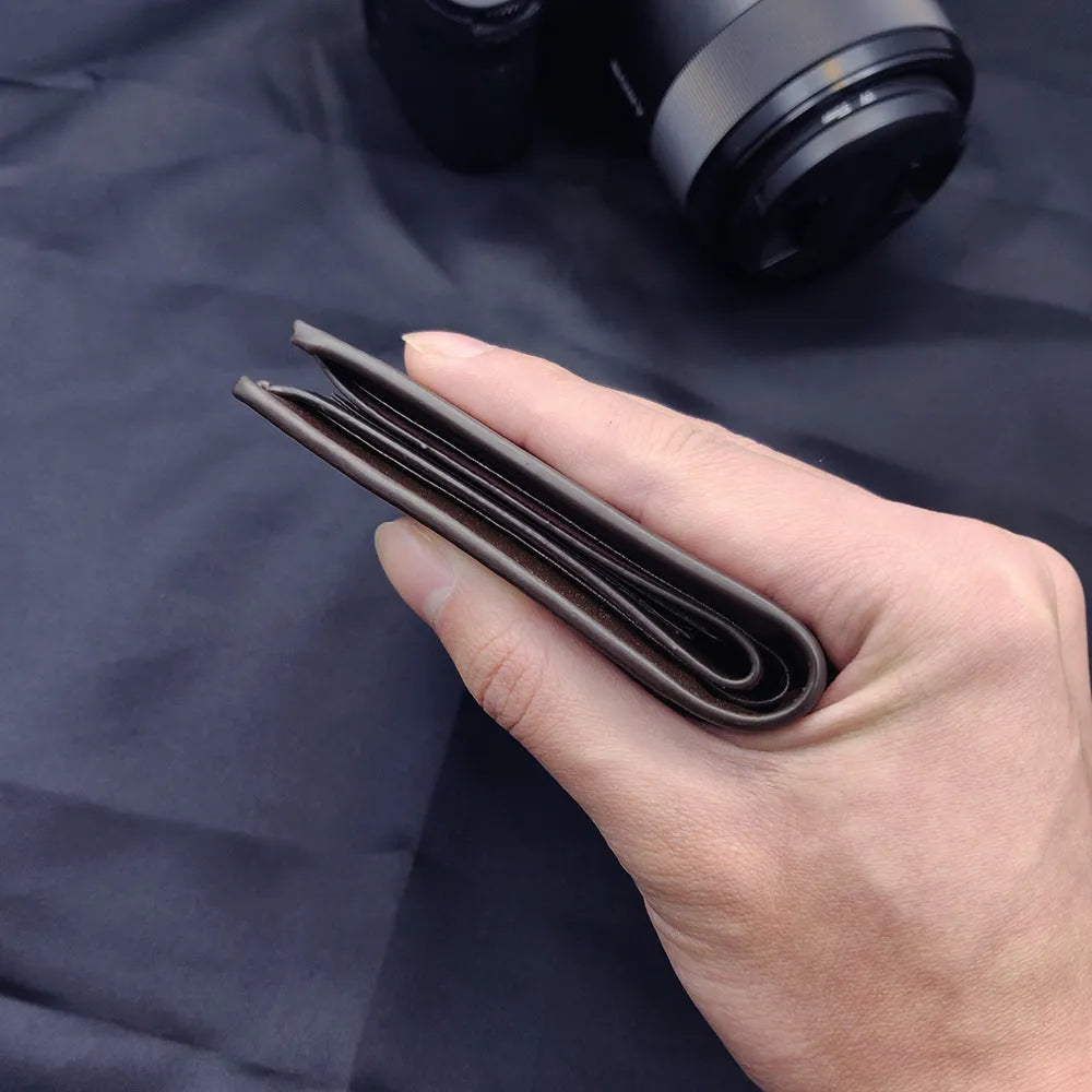 Men's leather wallet with a zipper closure, shown in one of seven available colours.