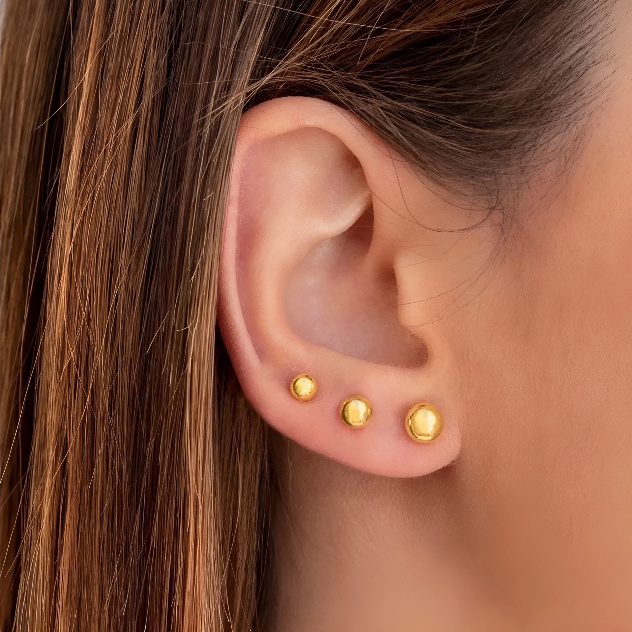 Titanium steel ball stud earrings with round geometric design in gold and silver electroplated finishes