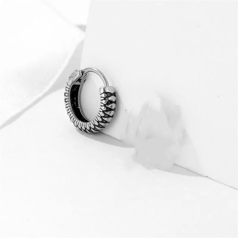 Silver stainless steel retro twist earrings with geometric striped pattern and round elements