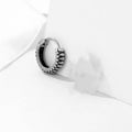 Silver stainless steel retro twist earrings with geometric striped pattern and round elements