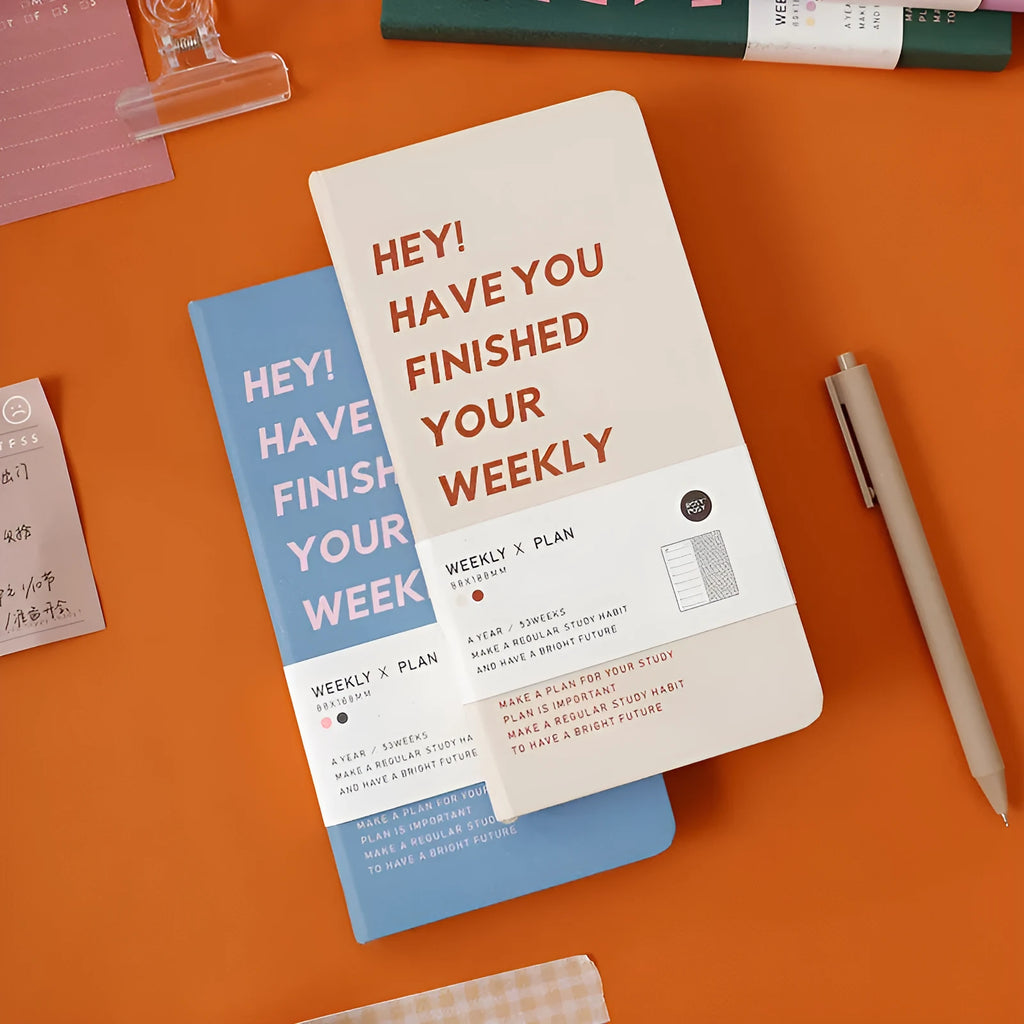 A5 weekly plan diary handbook for 2024 with 100 pages in blue, brown, green, and purple colours
