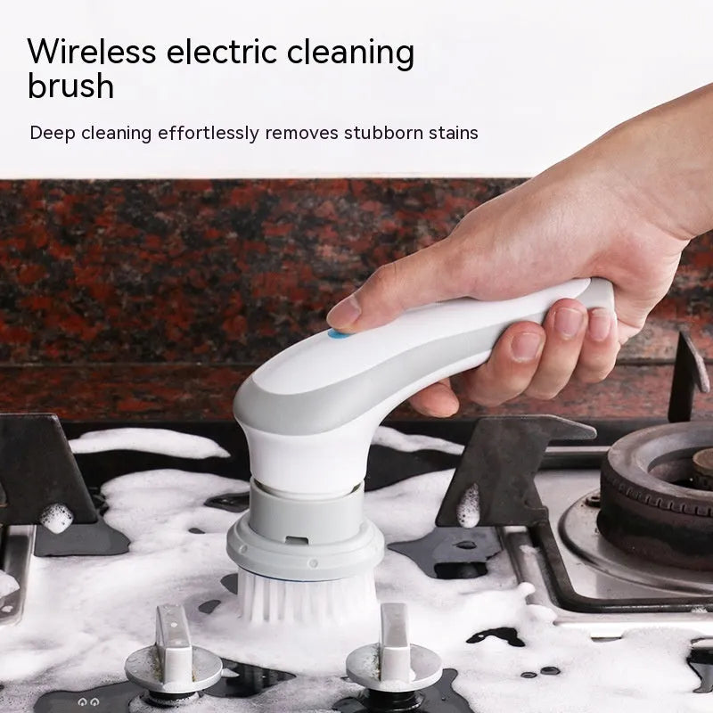 White cordless electric spinning cleaning brush with multiple brush heads on wall bracket