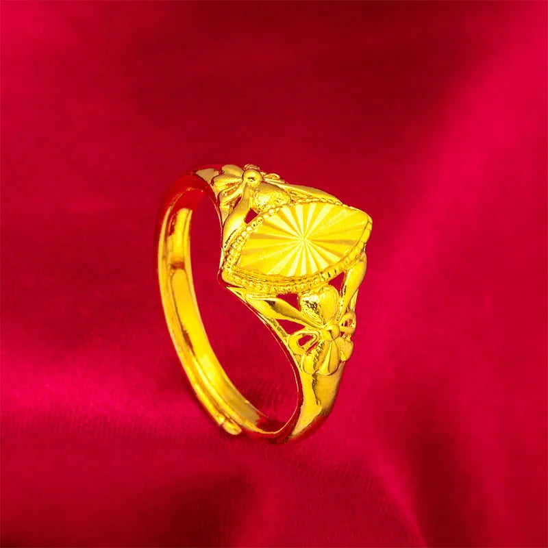 Geometric open flower ring with gold electroplated finish and textured brass surface