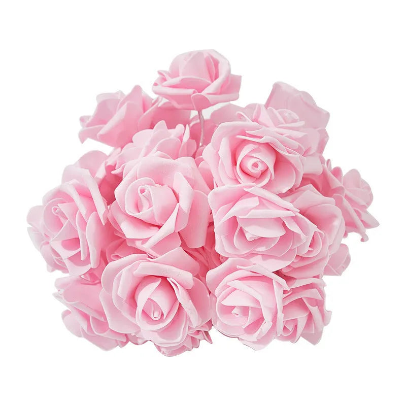 LED rose fairy lights with battery pack showing pink foam rose-shaped covers on 1.5 metre cable