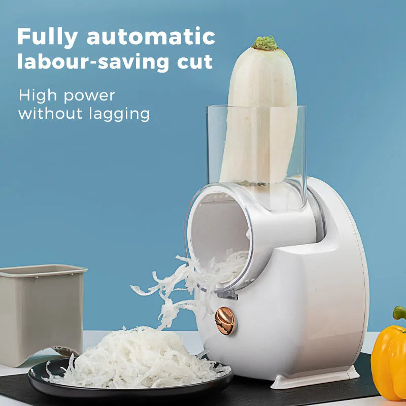 White electric vegetable slicer with multiple blades on suction base for kitchen use