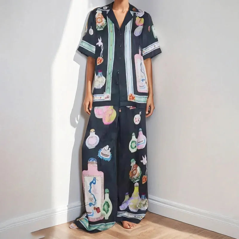 Black women's casual set with cartoon pattern cardigan and matching trousers