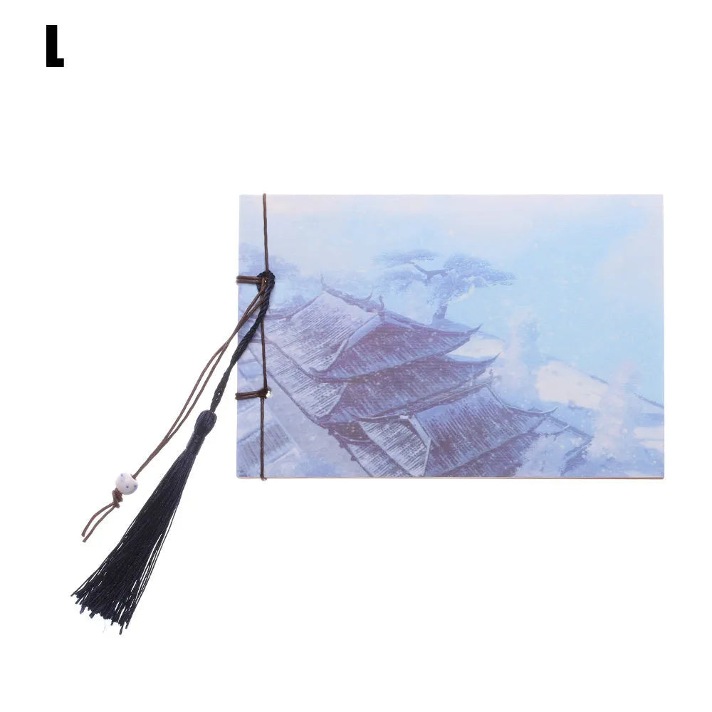 A5 kraft paper notebook with a hand-stitched binding and a hanging tassel bookmark in a natural design.