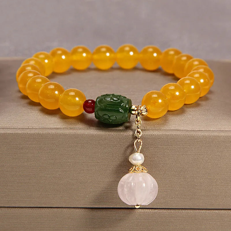Women's yellow agate crystal bracelet on gold silk cord with adjustable 19-20cm length
