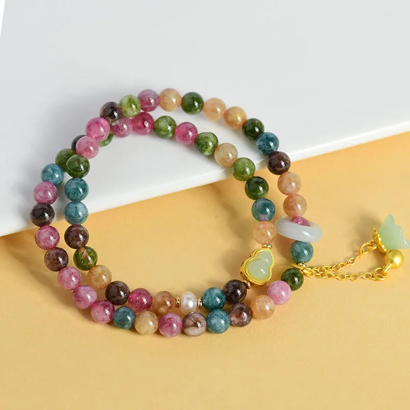 Chalcedony double circle bracelet with 6-6.5mm beads in a geometric design.