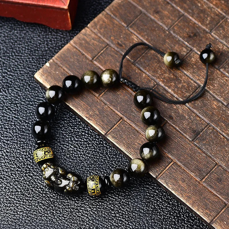 Hand-woven golden obsidian Pi Xiu bracelet with zodiac animal design in Chinese style