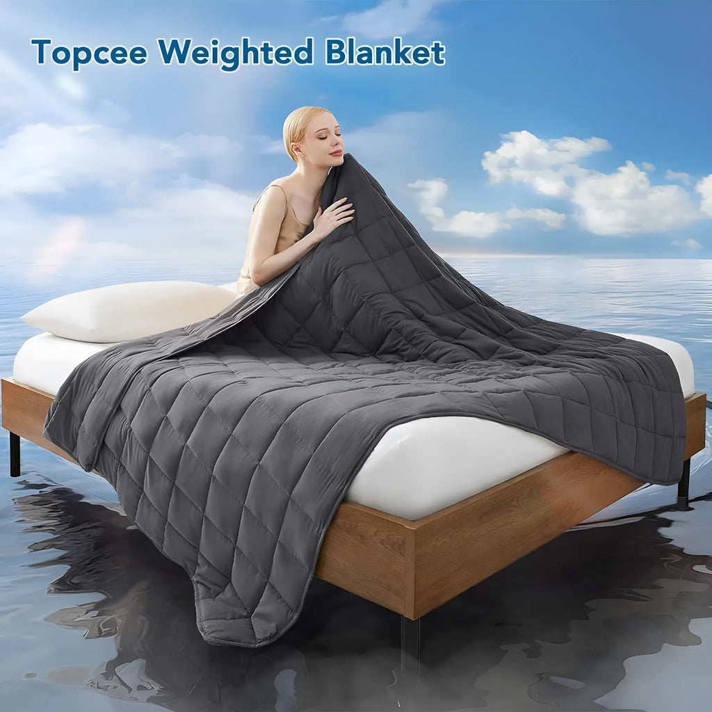 Solid grey polyester weighted blanket 152x203cm on a sofa with European style