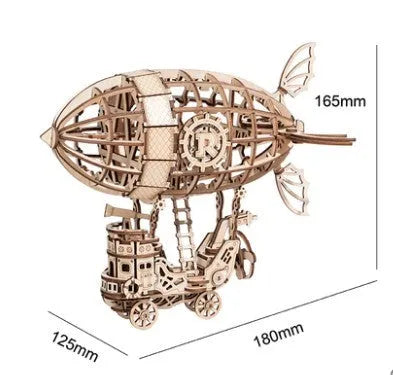 Assembled wooden 3D puzzle model of a Pumpkin Carriage on a white surface, laser-cut plywood construction