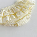 Beige cotton girls summer set with sleeveless ruffled collar top and double-layer bud-waisted shorts