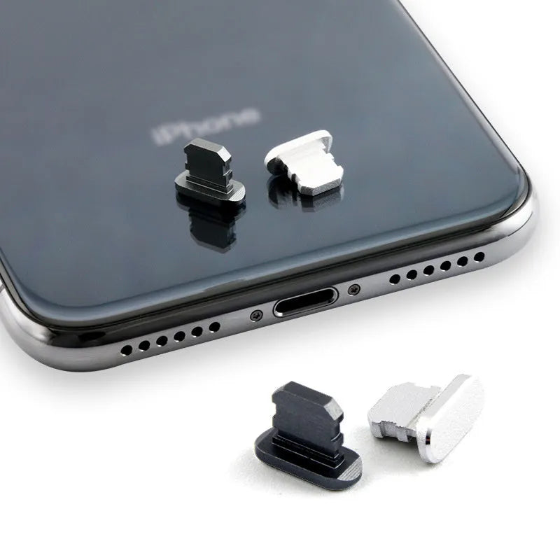 Aluminium alloy dust plug for iPhone charging port in various metallic colours.