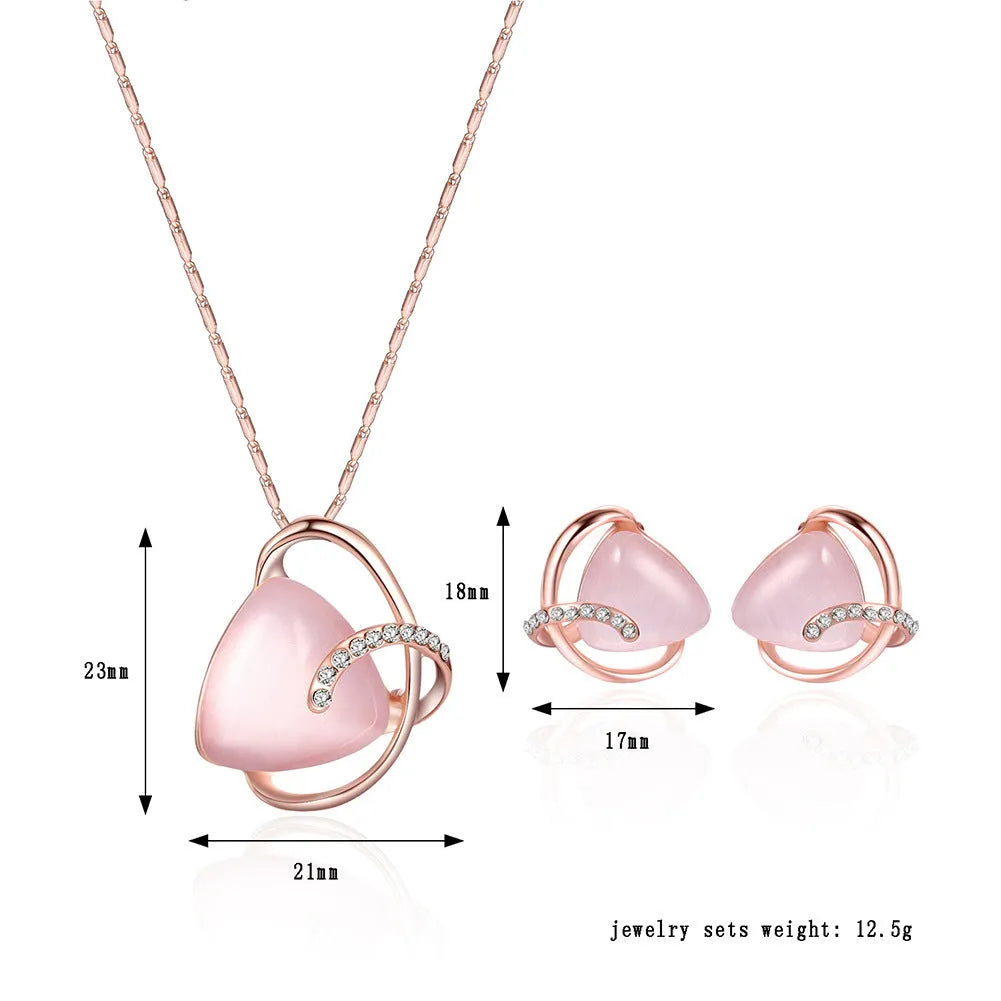 Rose gold alloy necklace and earrings two piece set with pendant and inlaid gems for bridal party
