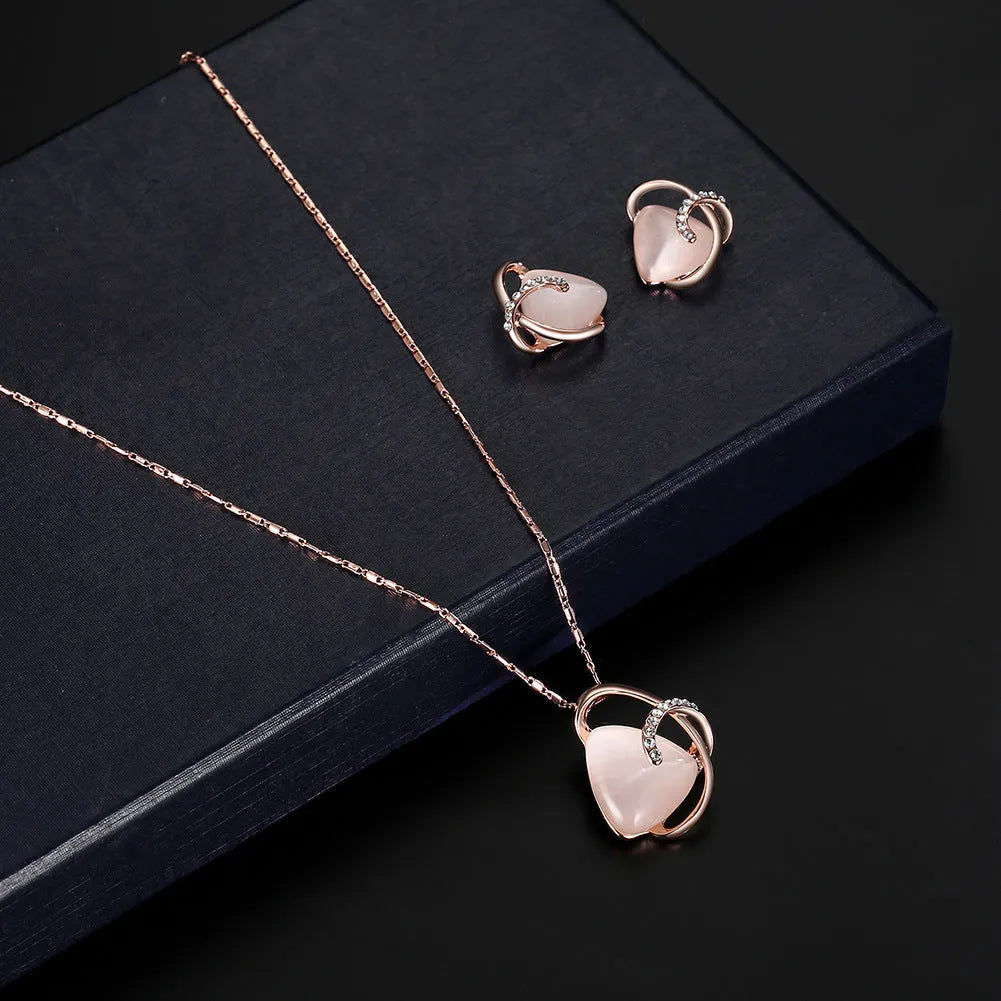 Rose gold alloy necklace and earrings two piece set with pendant and inlaid gems for bridal party