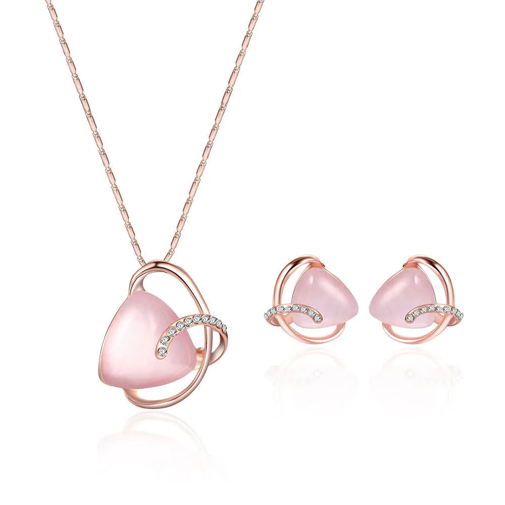 Rose gold alloy necklace and earrings two piece set with pendant and inlaid gems for bridal party