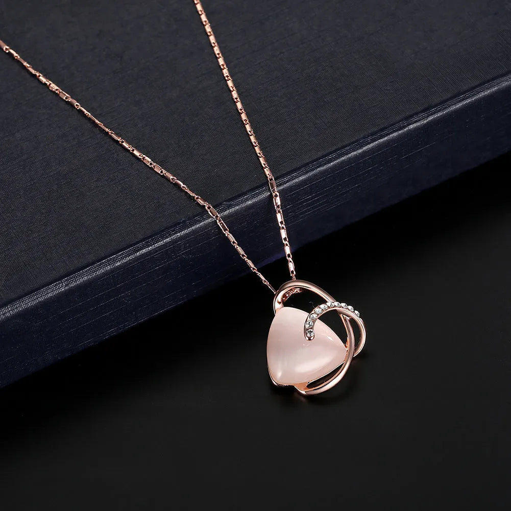 Rose gold alloy necklace and earrings two piece set with pendant and inlaid gems for bridal party