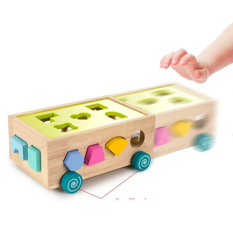 Wooden geometric shape sorter on wheels with colourful cubes and 17 holes for toddlers age 3 plus