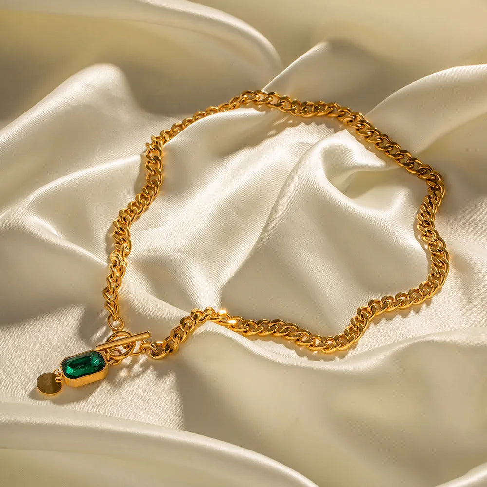 Gold French retro zircon pendant necklace with geometric round design on Cuban link chain