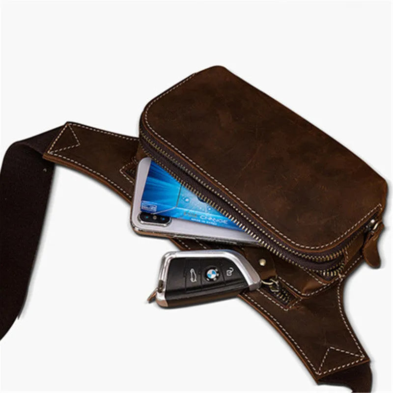 Brown top layer cowhide leather men's sports waist bag with pull-tab closure.