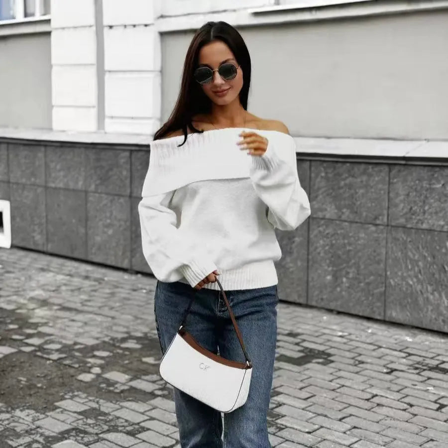 Grey strapless off-the-shoulder sweater with a 3D pattern on a mannequin.