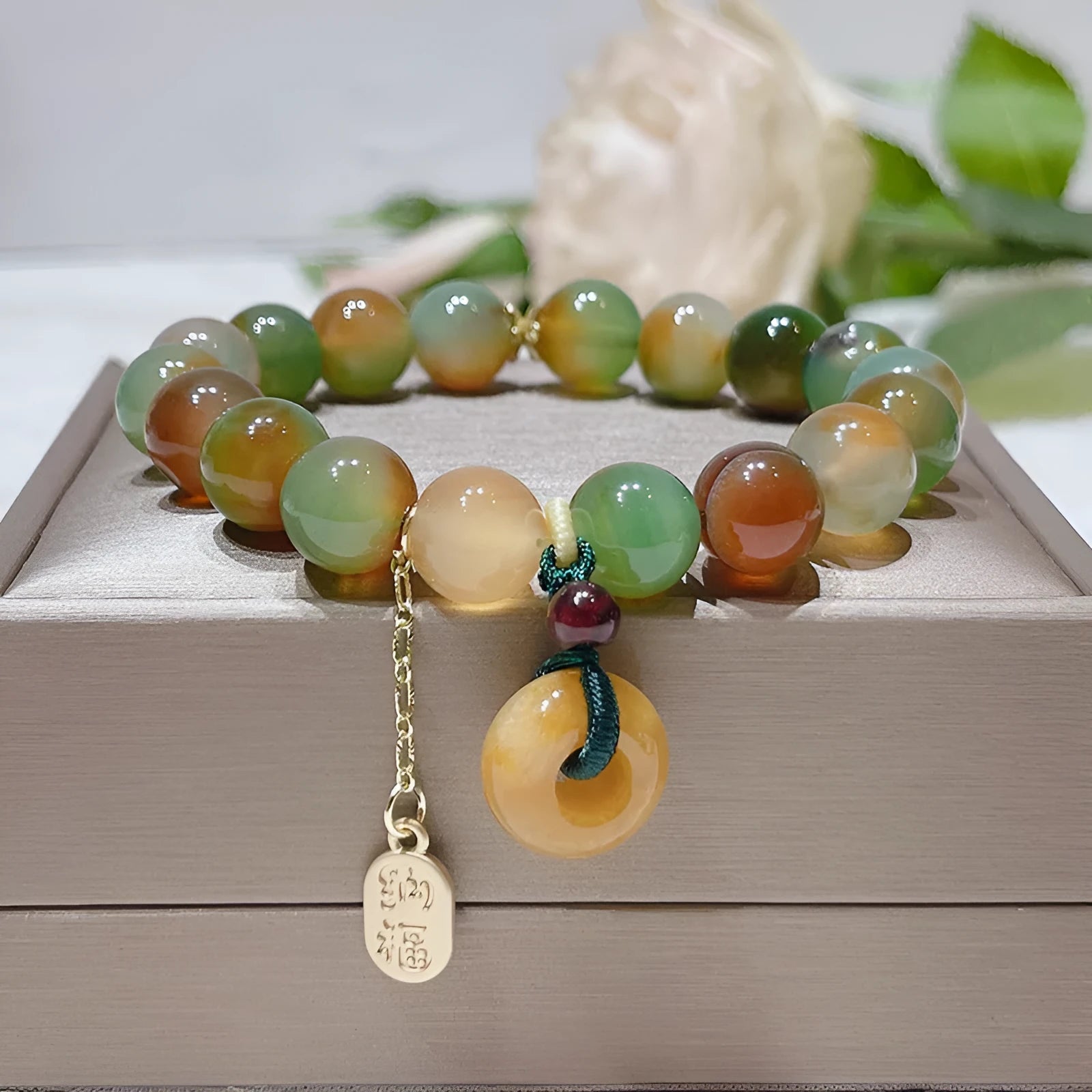 Yellow peacock agate bracelet with peace buckle clasp and old mine topaz stones
