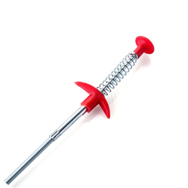 Black sewer dredge spring drain unclogging tool with PP handle next to a kitchen sink