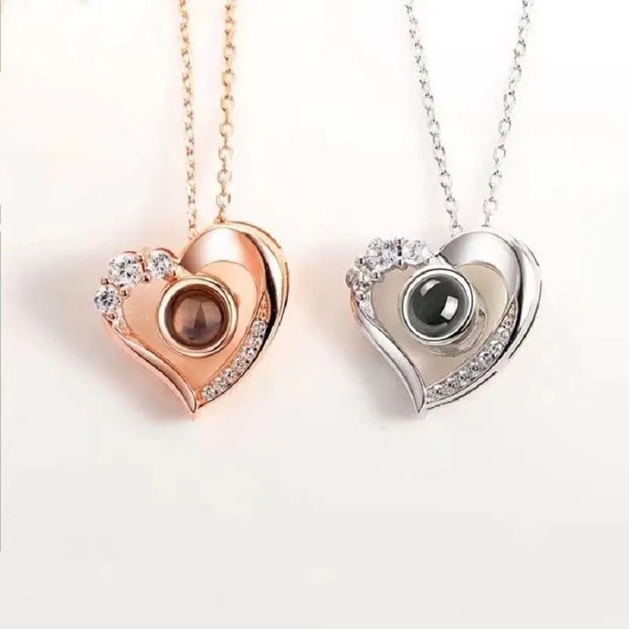 Geometric copper projection necklace with diamond inlay, rose gold finish, cross chain style on collarbone