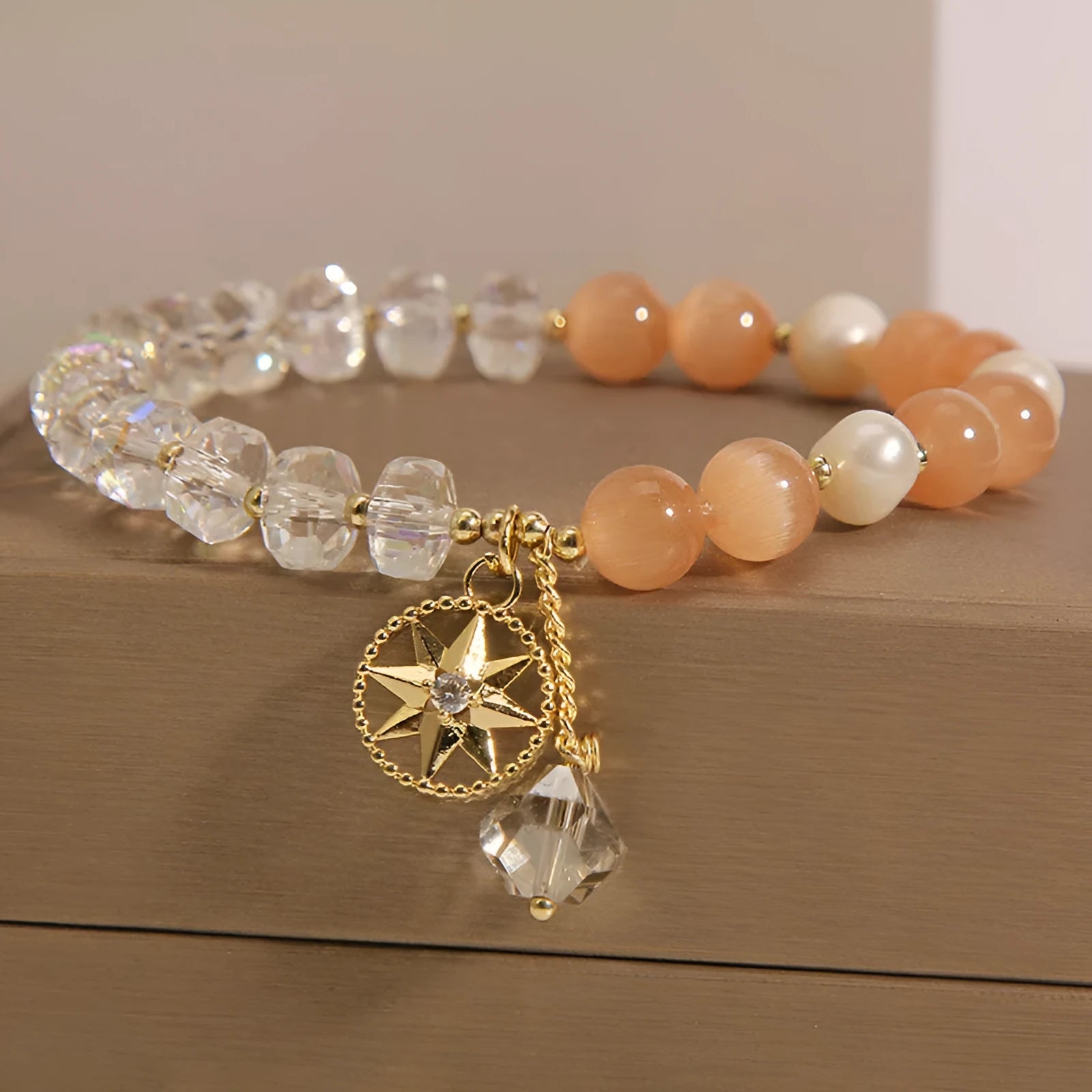 Orange Eight Awn Star bracelet for women with gold-plated inlay and artificial gemstone accents