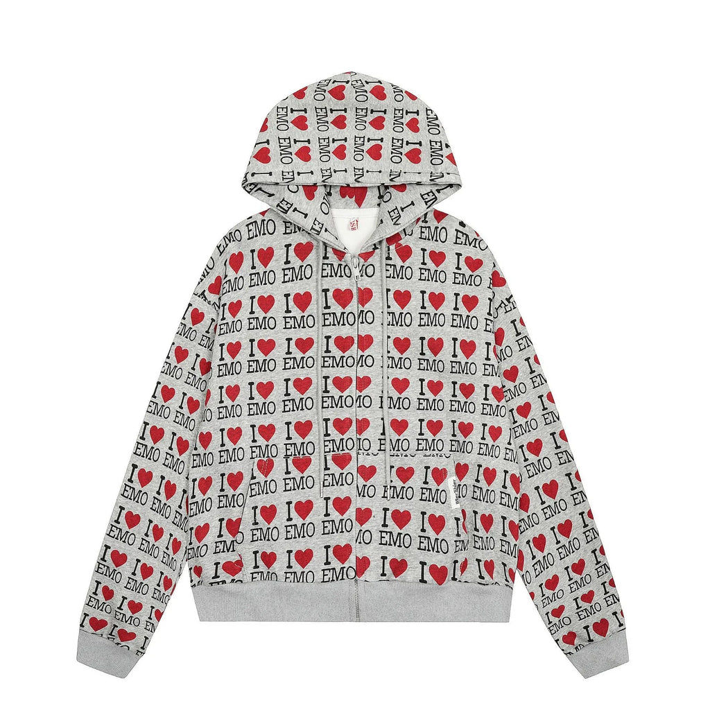 Women's melange grey cotton cardigan with a retro pattern and hood on a hanger.