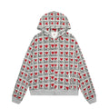 Women's melange grey cotton cardigan with a retro pattern and hood on a hanger.