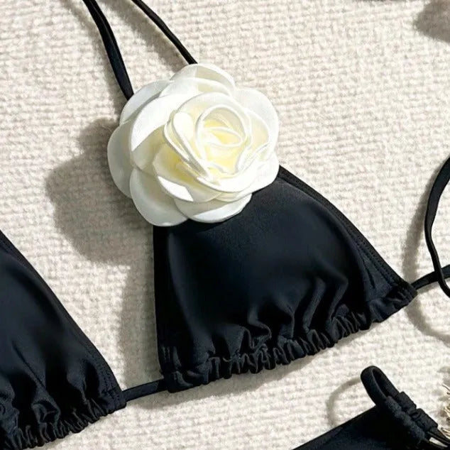 Black 3D flower drawstring lace split bikini set on a mannequin.